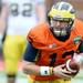 Michigan quarterback Alex Swieca runs the ball during spring practice at Michigan Stadium on Saturday, April 13, 2013. Melanie Maxwell I AnnArbor.com